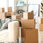 moving boxes in living room Metropolitan Moving & Storage