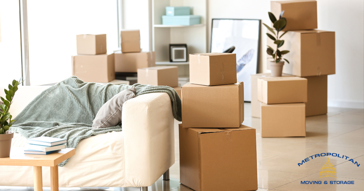moving boxes in living room Metropolitan Moving & Storage