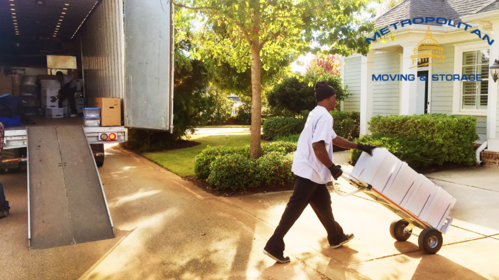 mover using a hand truck for moving Metropolitan Moving & Storage