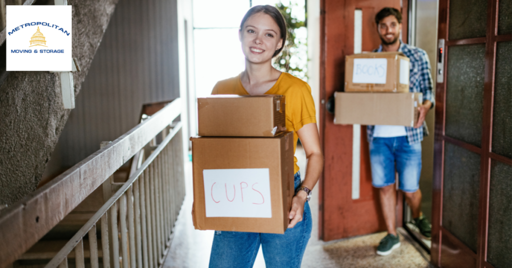 two people moving into an apartment Metropolitan Moving & Storage